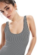 scoop neck low back high leg swimsuit in black and white stripe