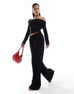 exclusive ribbed asymmetric off shoulder long sve top and trouser co-ord in black